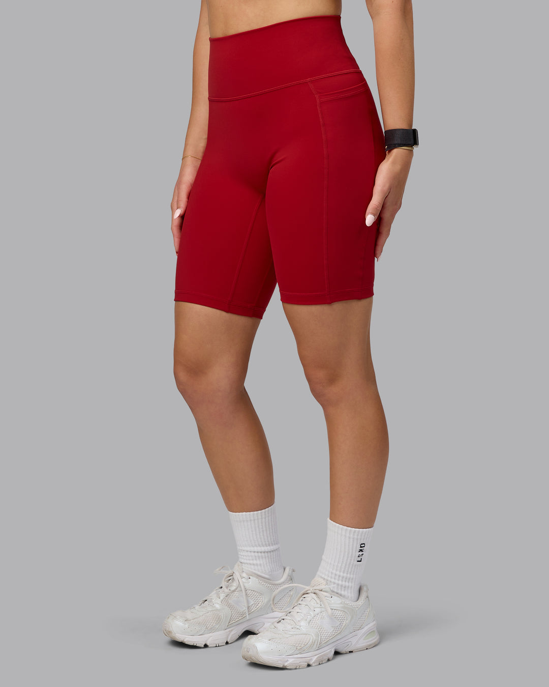 Woman wearing Fusion Bike Shorts with Pockets - Cherry Red