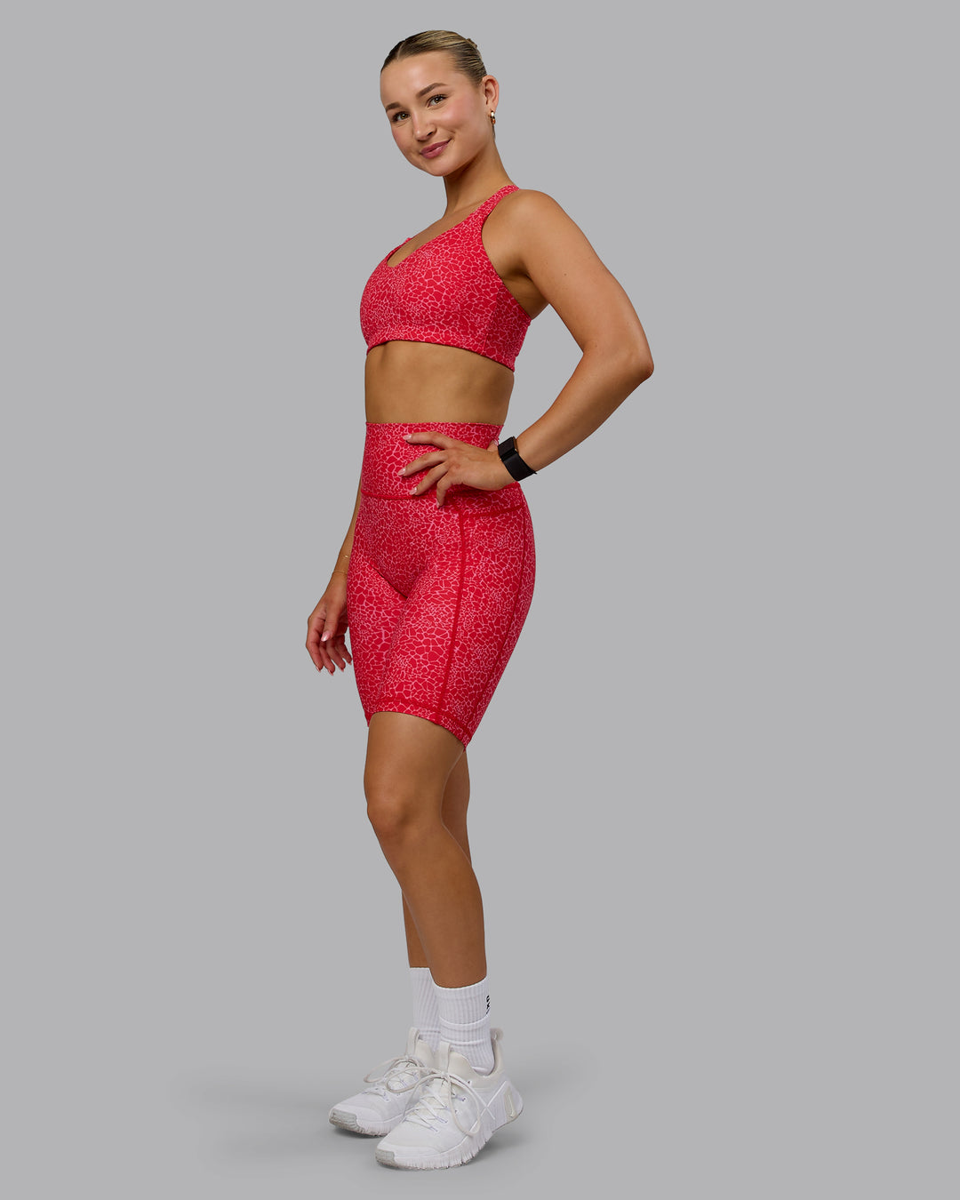 Woman wearing Fusion Bike Shorts - Red Vitality Print