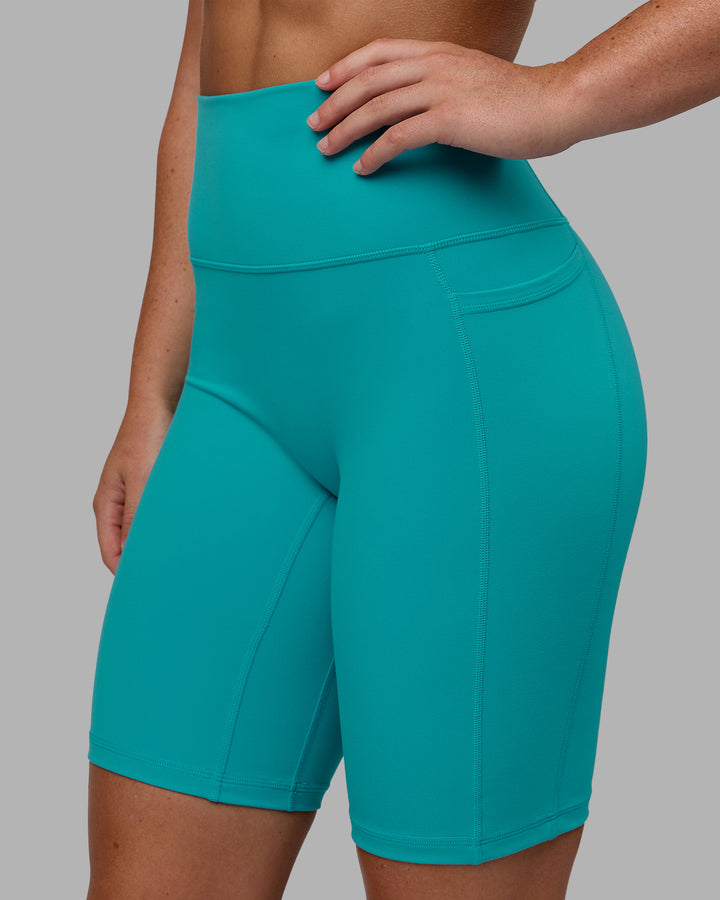 Woman wearing Fusion Bike Shorts - Uplift Blue
