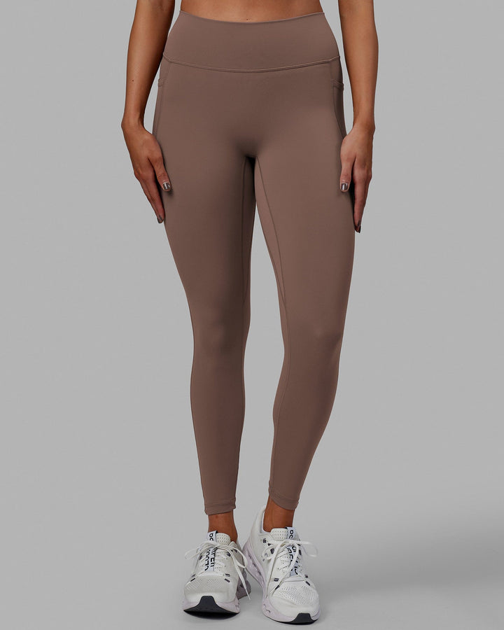 Woman wearing Fusion Full Length Tight - Deep Taupe
