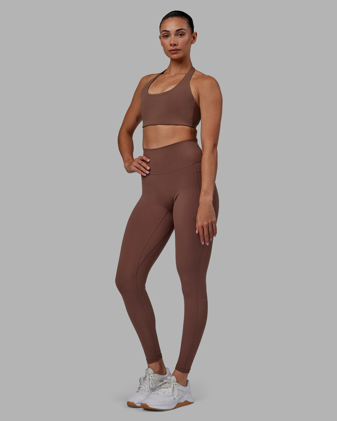 Woman wearing Fusion Full Length Tights - Dull Rust