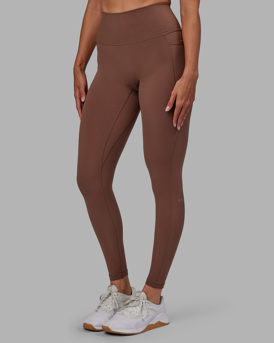 Woman wearing Fusion Full Length Tights - Dull Rust