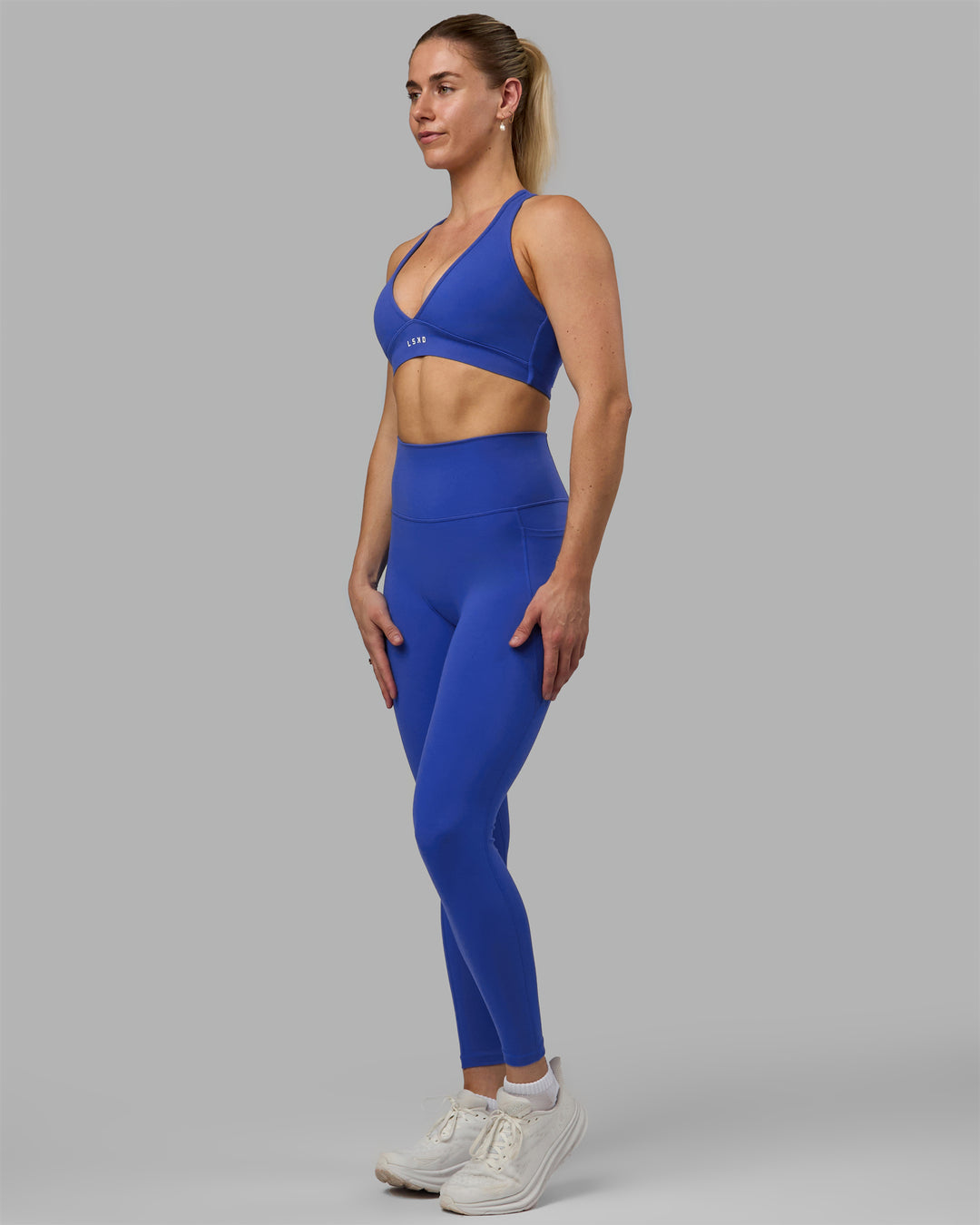 Woman wearing Fusion Full Length Tights - Power Cobalt