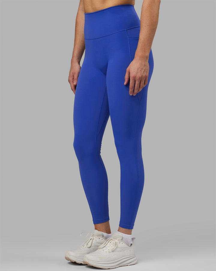 Woman wearing Fusion Full Length Tights - Power Cobalt
