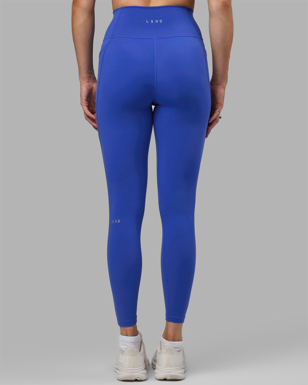 Woman wearing Fusion Full Length Tights - Power Cobalt