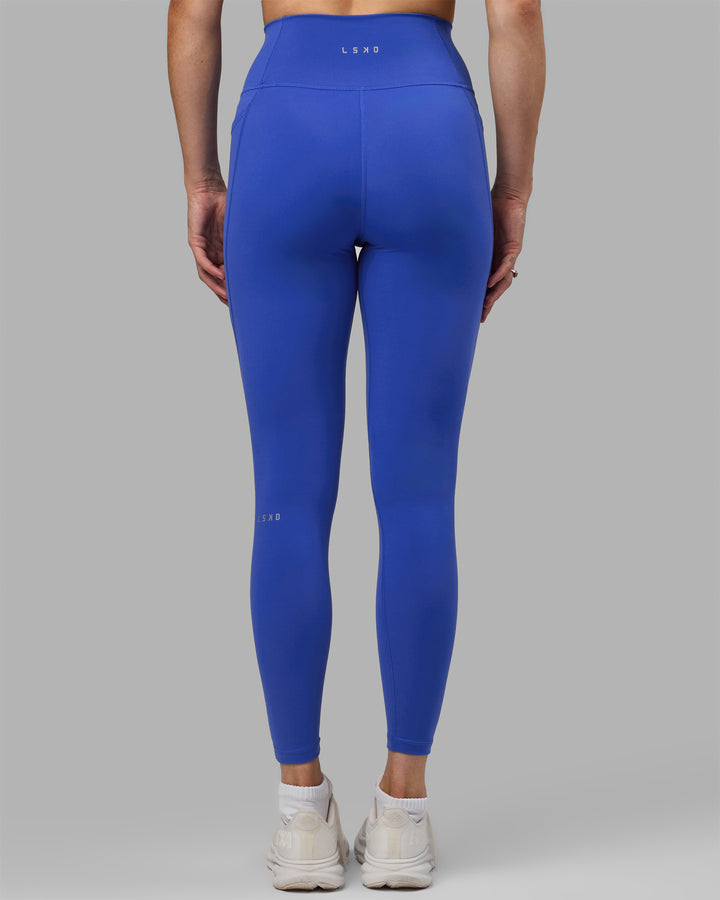 Woman wearing Fusion Full Length Tights - Power Cobalt
