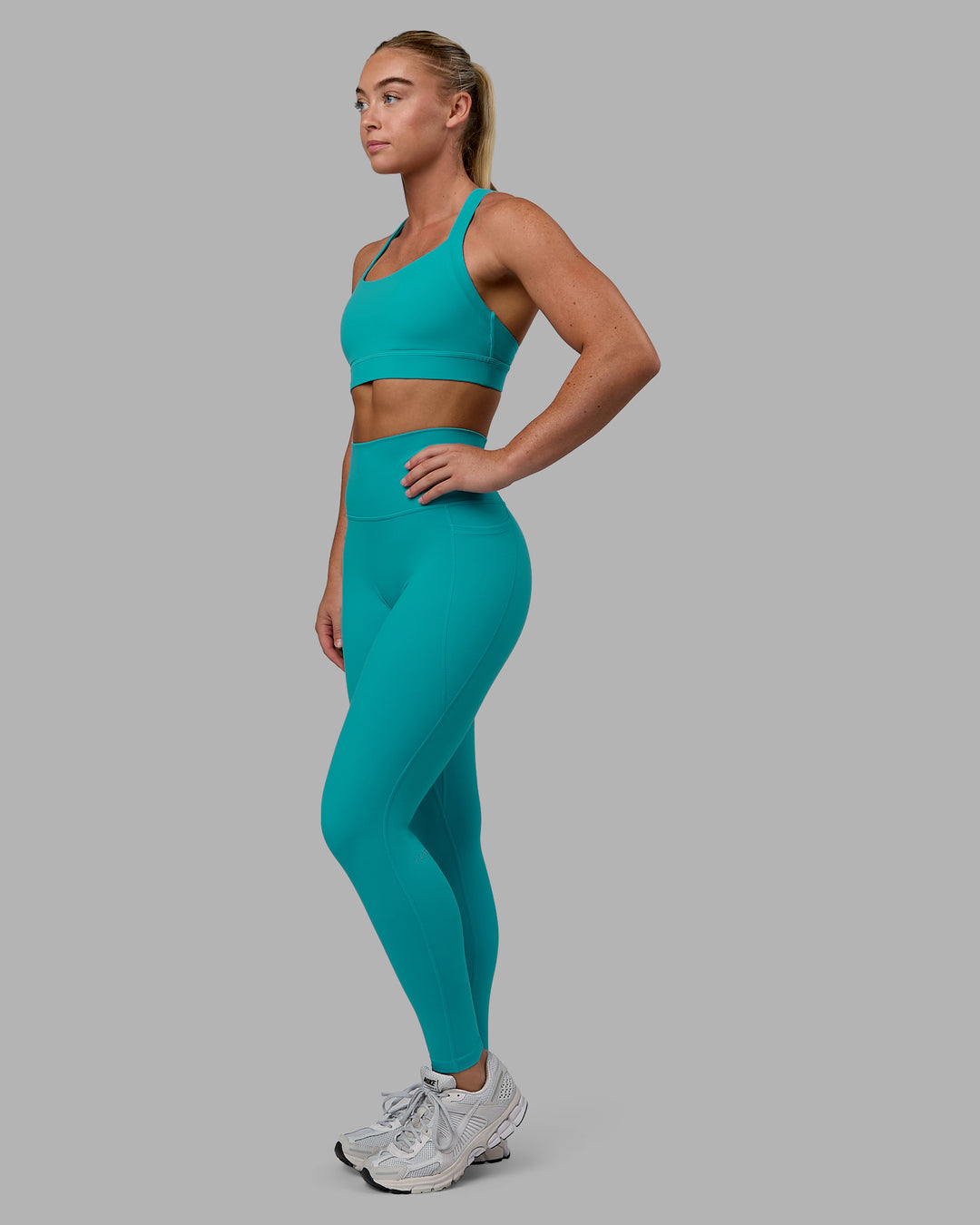 Woman wearing Fusion Full Length Tights - Uplift Blue