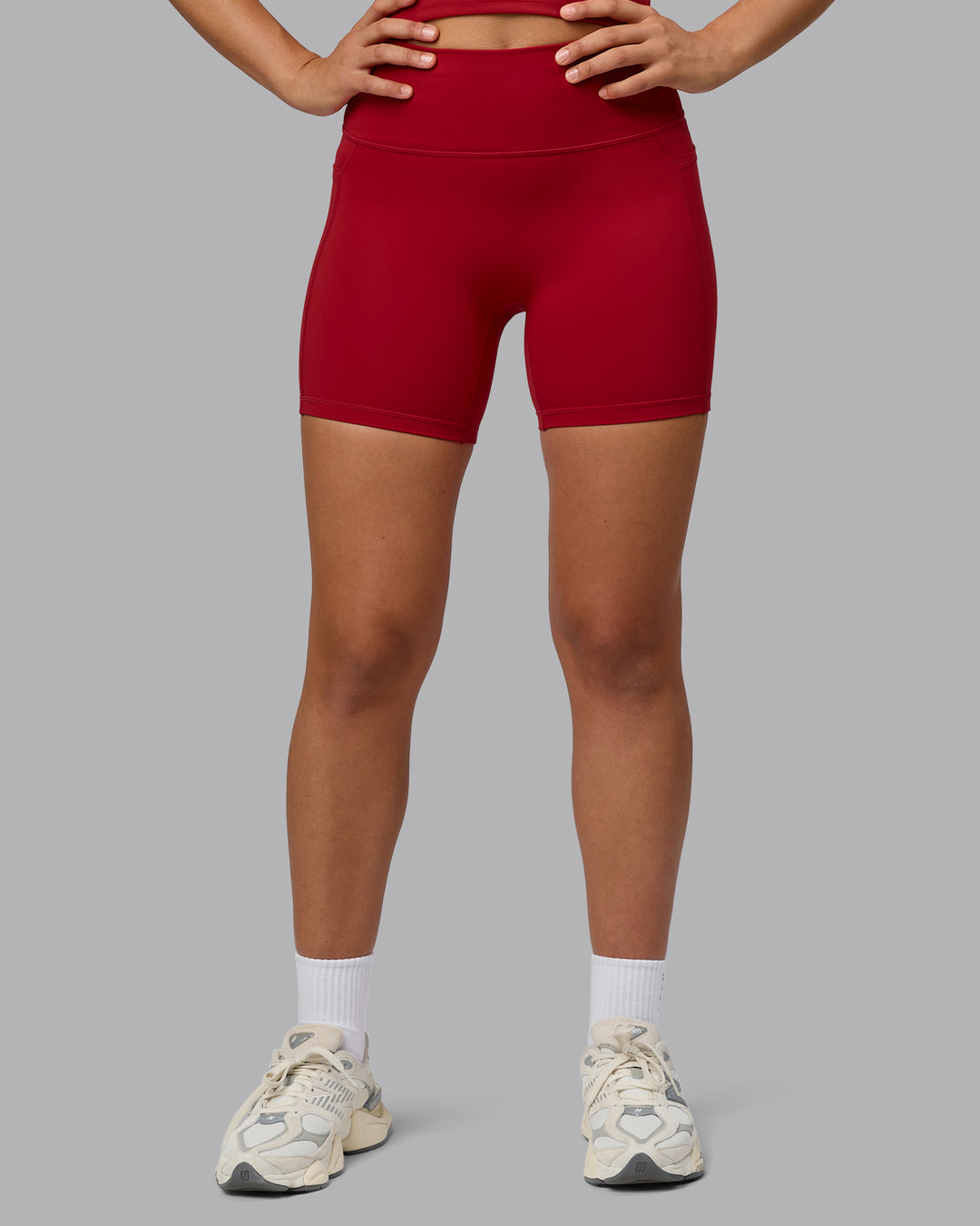 Woman wearing Fusion Mid Short Tights with Pockets - Cherry Red