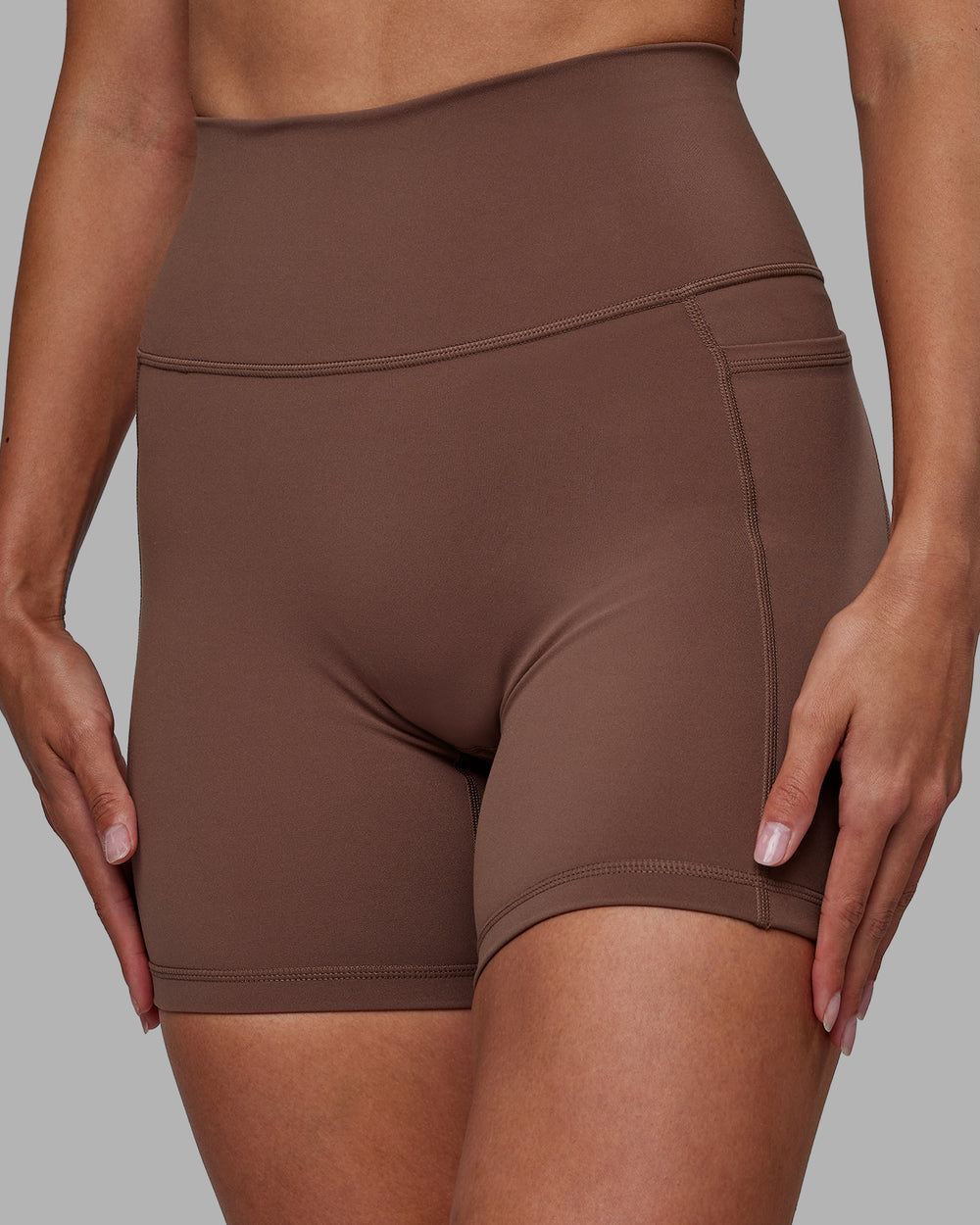 Woman wearing Fusion Mid Short Tights - Dull Rust