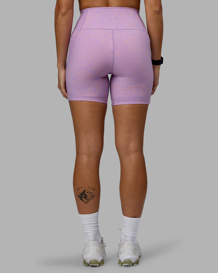 Woman wearing Fusion Mid Short Tights - Pale Lilac Vitality Print
