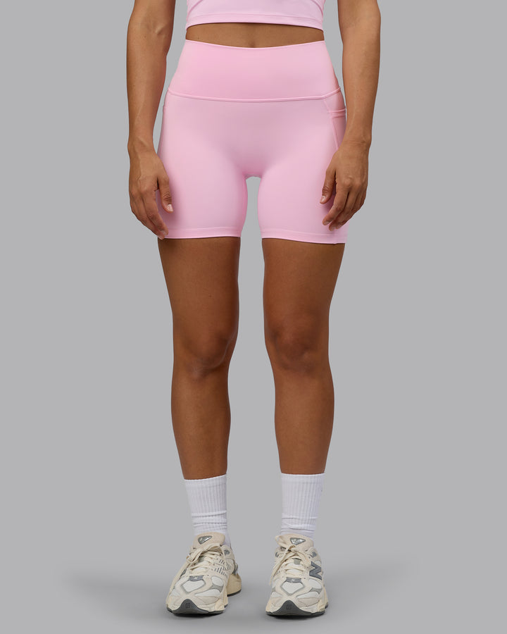 Woman wearing Fusion Mid Short Tights with Pockets - Pale Pink
