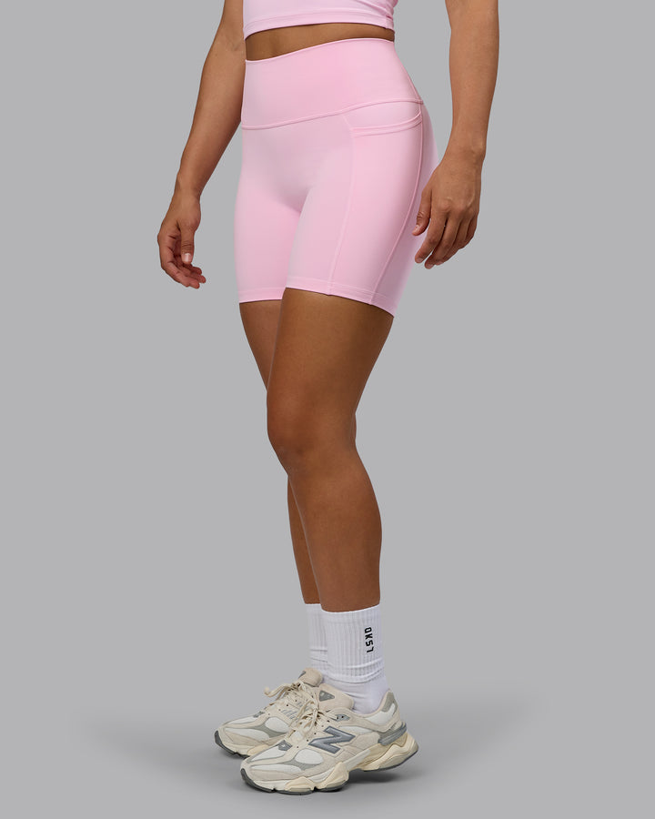 Woman wearing Fusion Mid Short Tights with Pockets - Pale Pink
