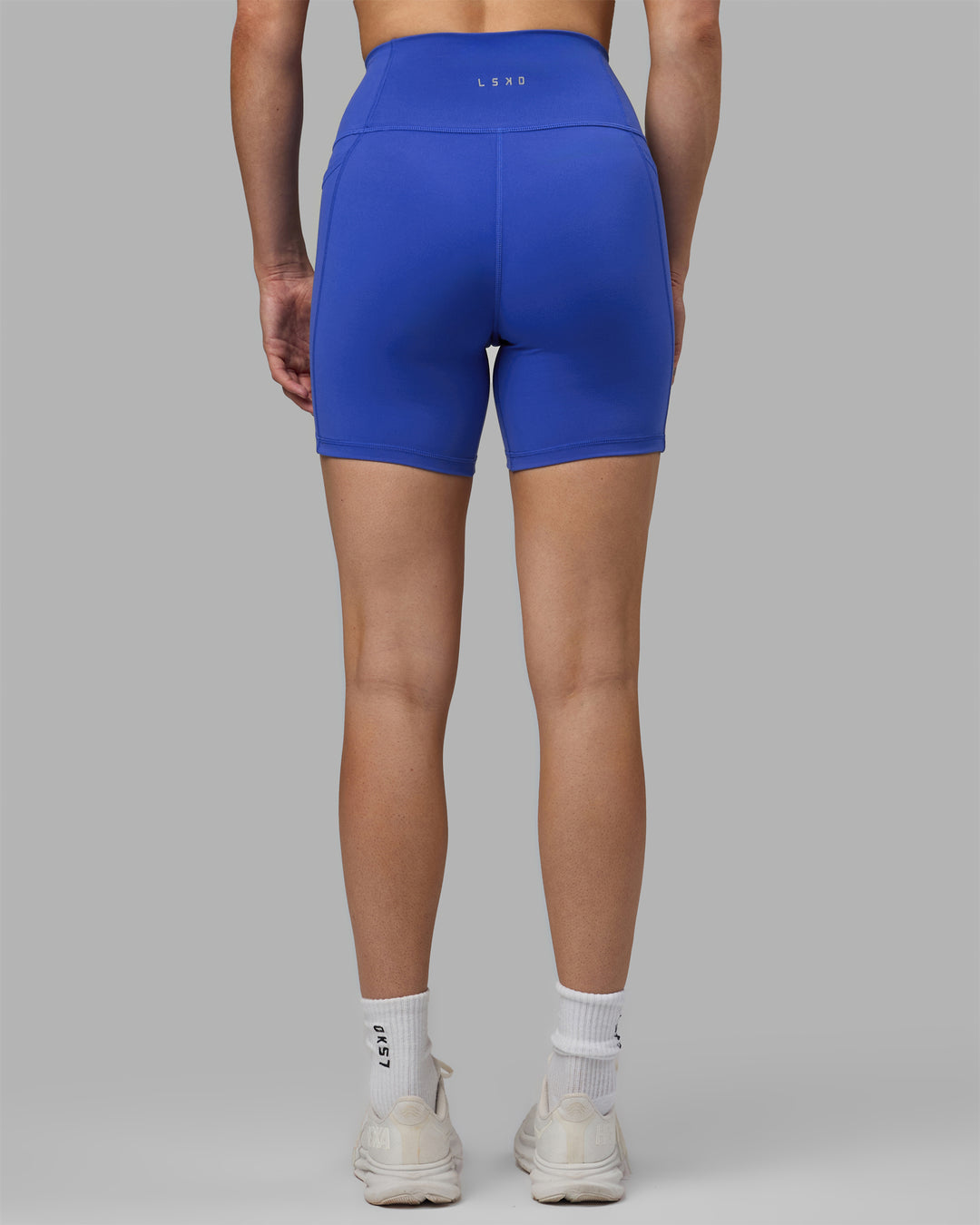 Woman wearing Fusion Mid Short Tights - Power Cobalt