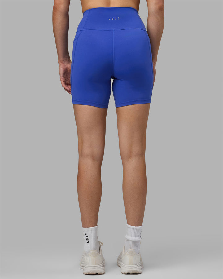 Woman wearing Fusion Mid Short Tights - Power Cobalt
