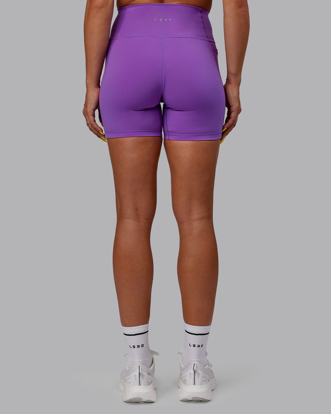 Woman wearing Fusion Mid Short Tights - Purple Swirl