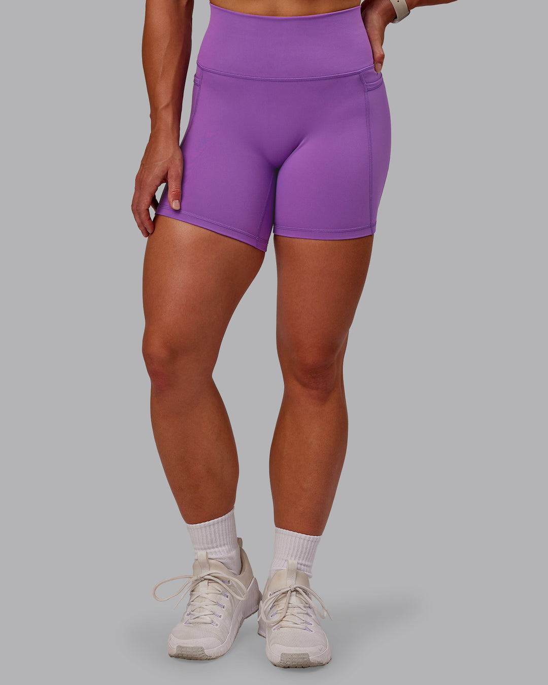 Woman wearing Fusion Mid Short Tight With Pockets - Purple Fizz