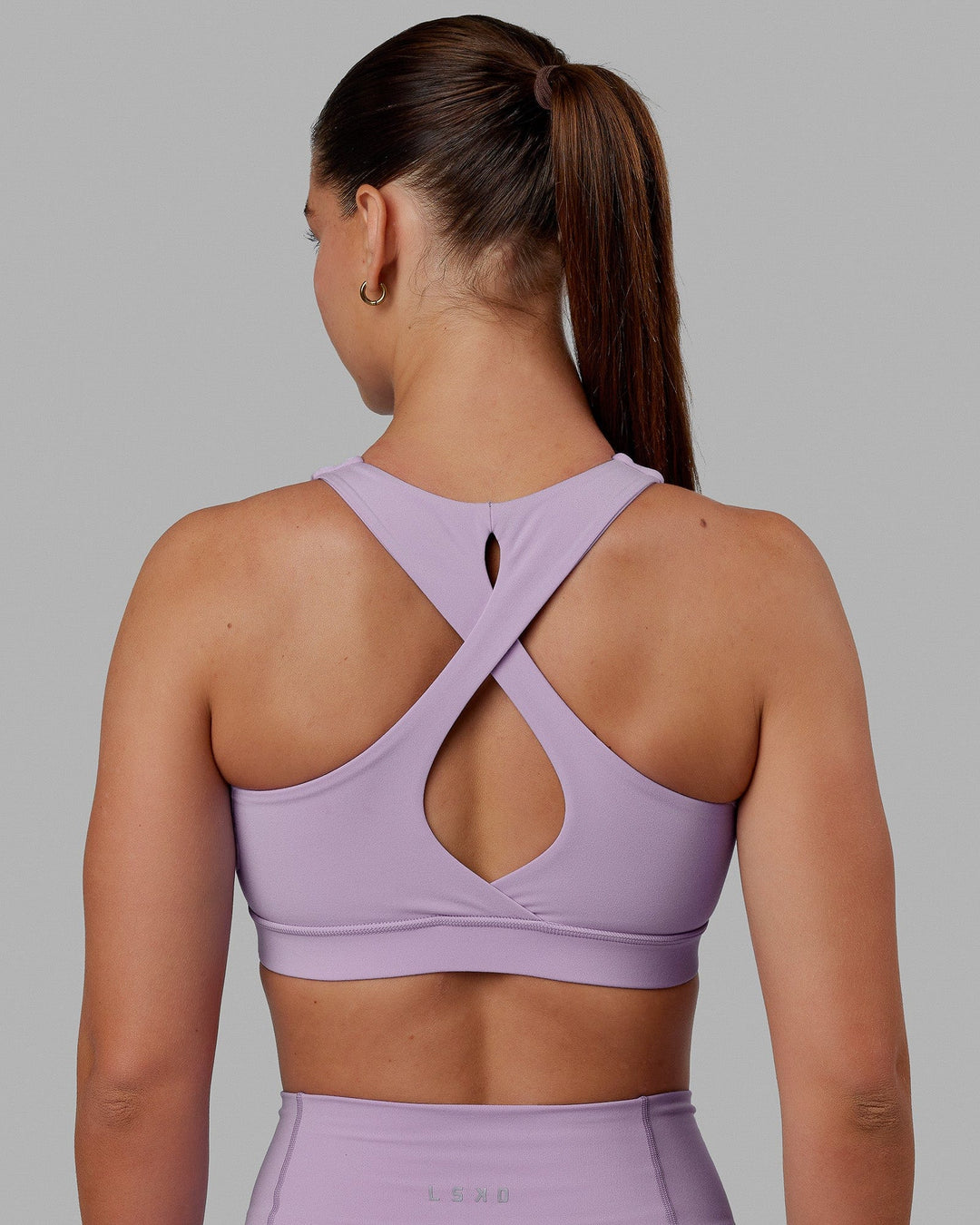 Woman wearing Fusion Sports Bra - Pale Lilac