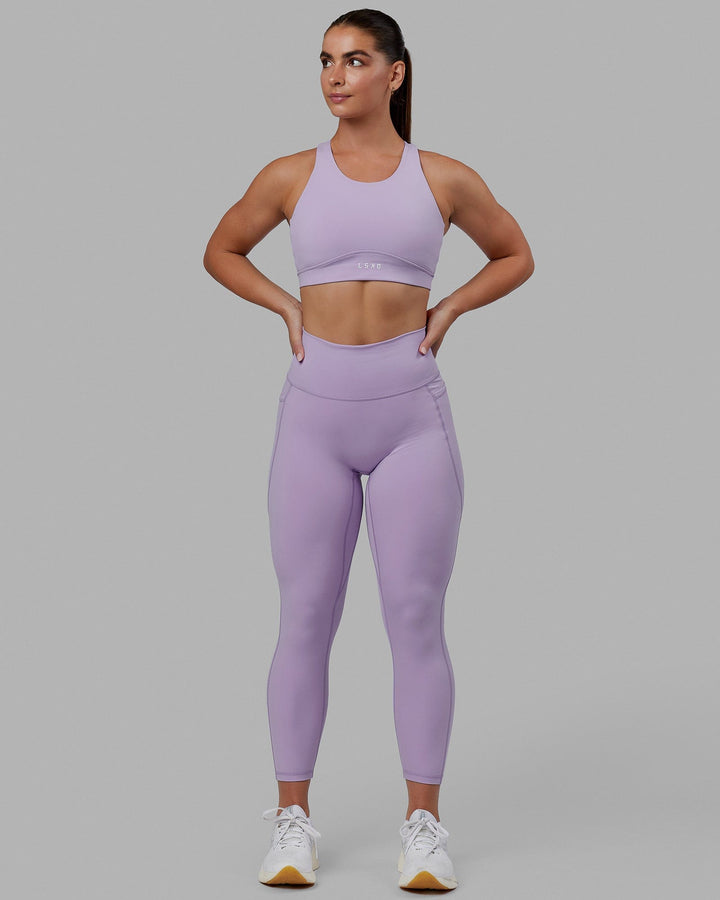 Woman wearing Fusion Sports Bra - Pale Lilac
