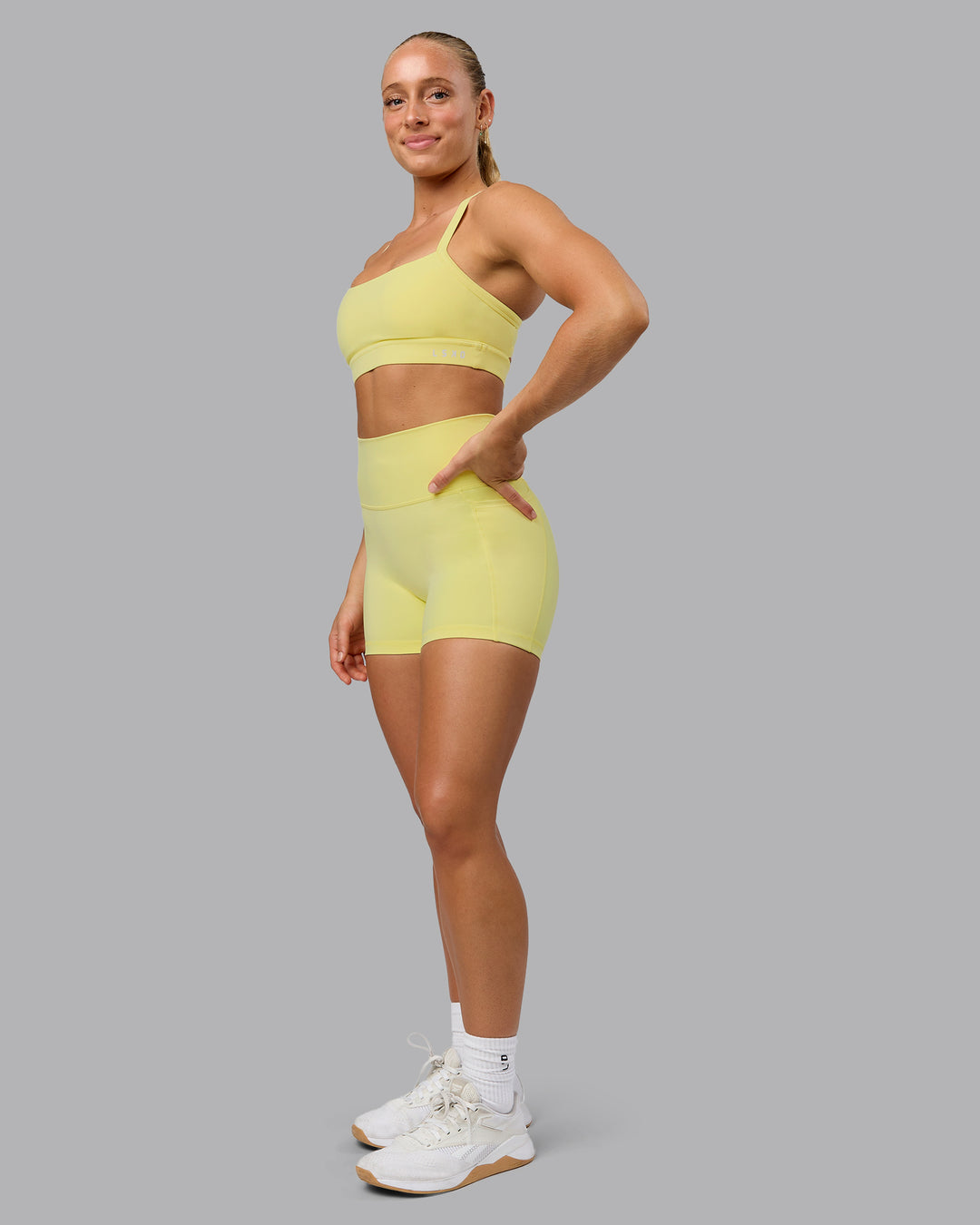 Woman wearing Fusion X-Short Tights With Pockets - Lemon Fizz