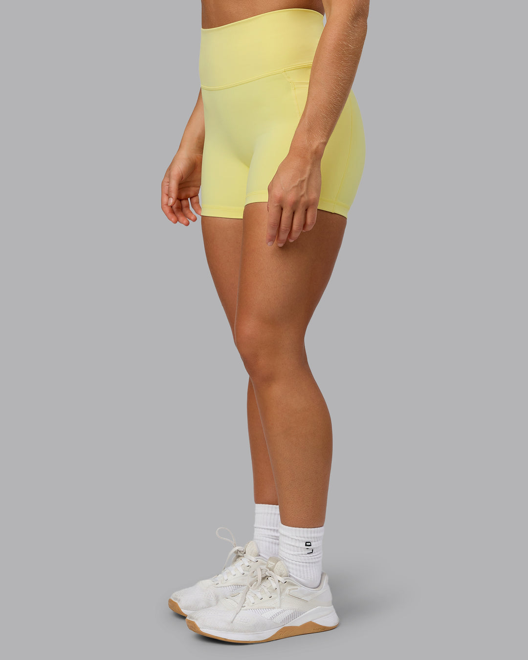 Woman wearing Fusion X-Short Tights With Pockets - Lemon Fizz