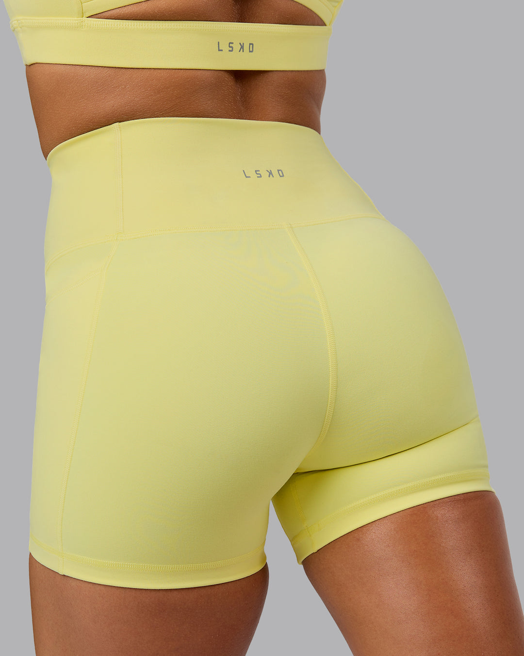 Woman wearing Fusion X-Short Tights With Pockets - Lemon Fizz