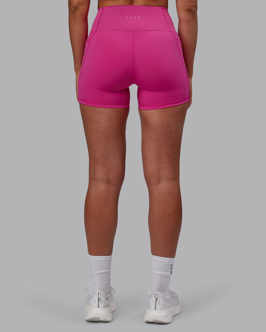 Woman wearing Fusion X-Short Tights - Fuchsia Pink