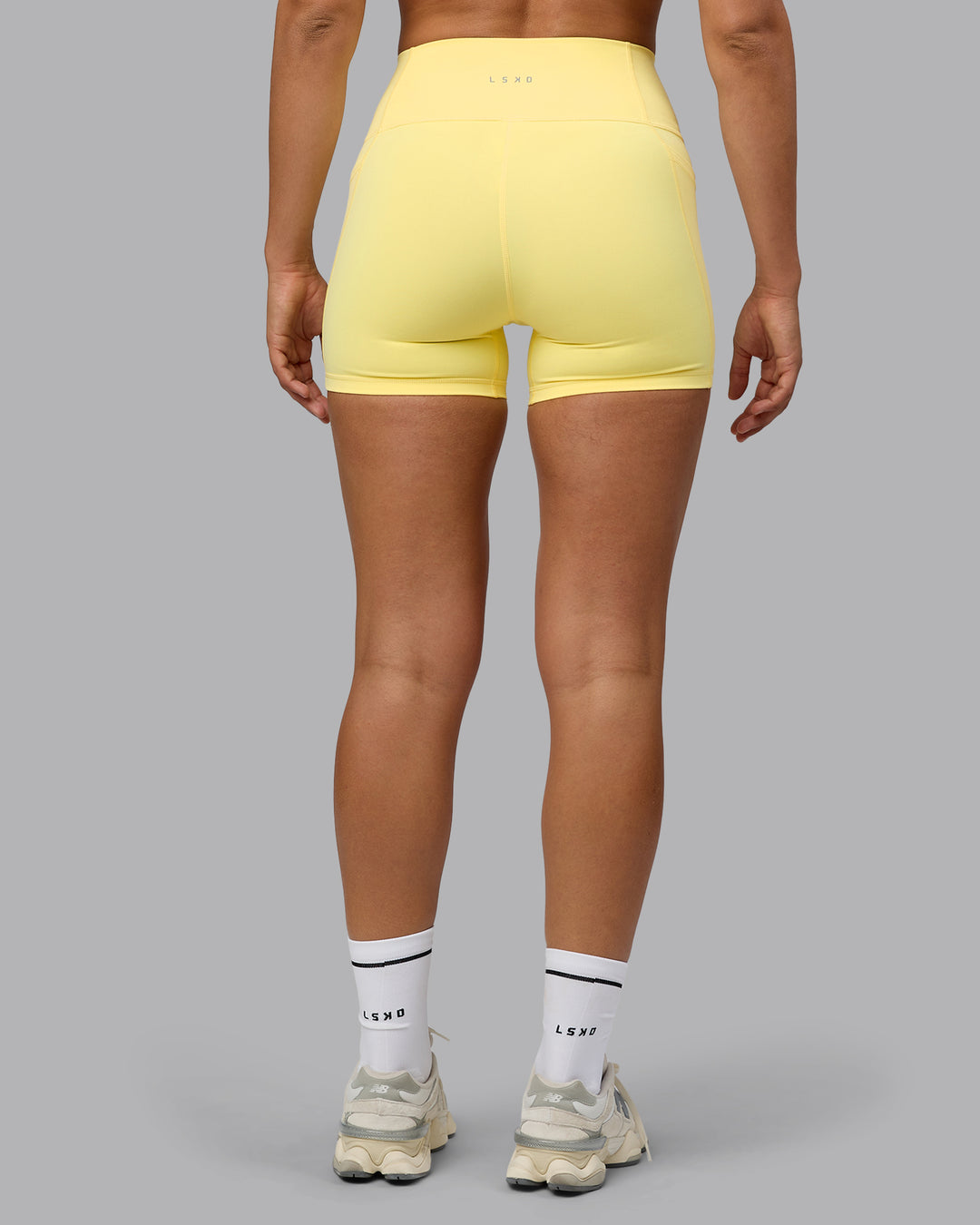 Woman wearing Fusion X-Short Tights with Pockets - Lemon