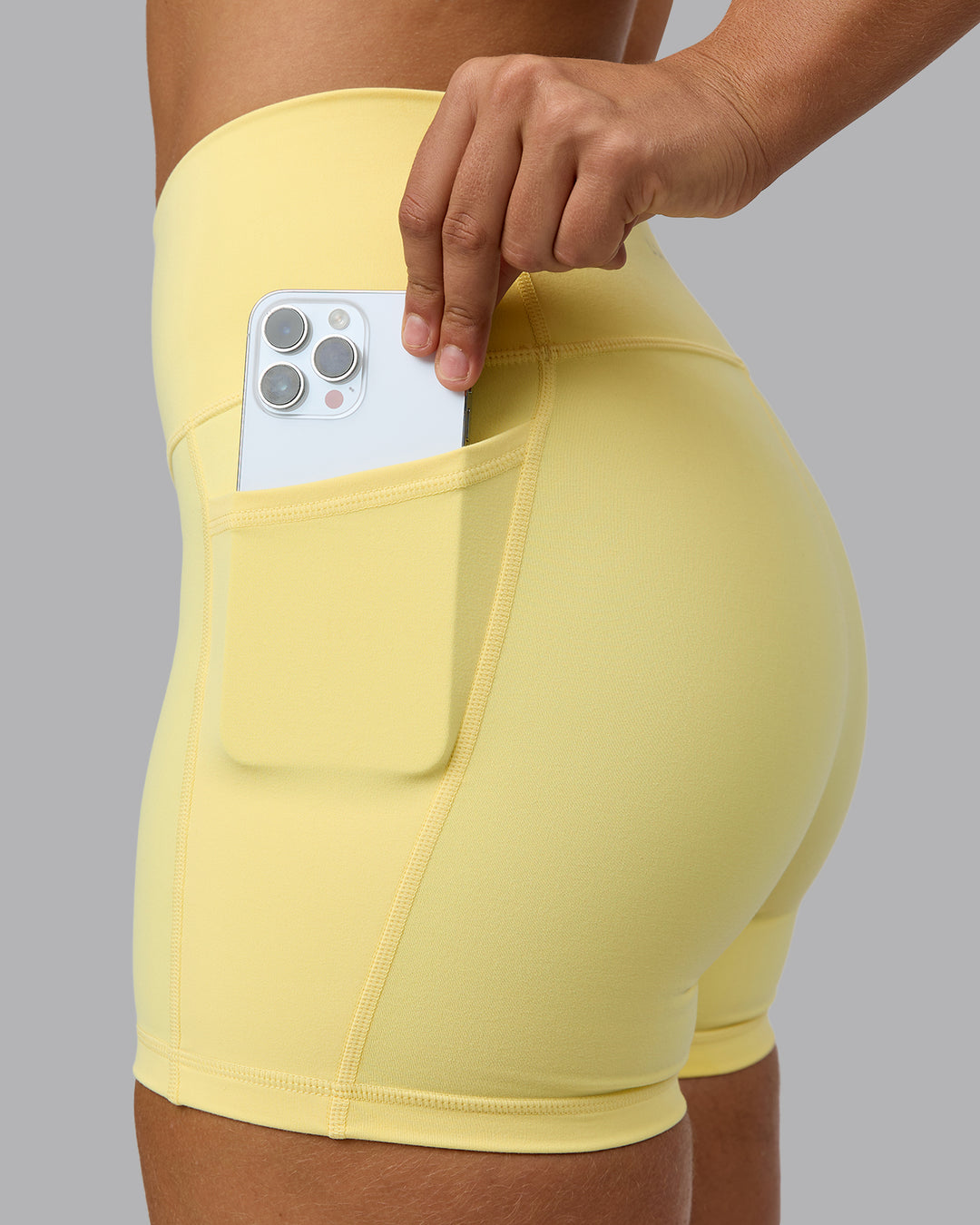 Woman wearing Fusion X-Short Tights with Pockets - Lemon