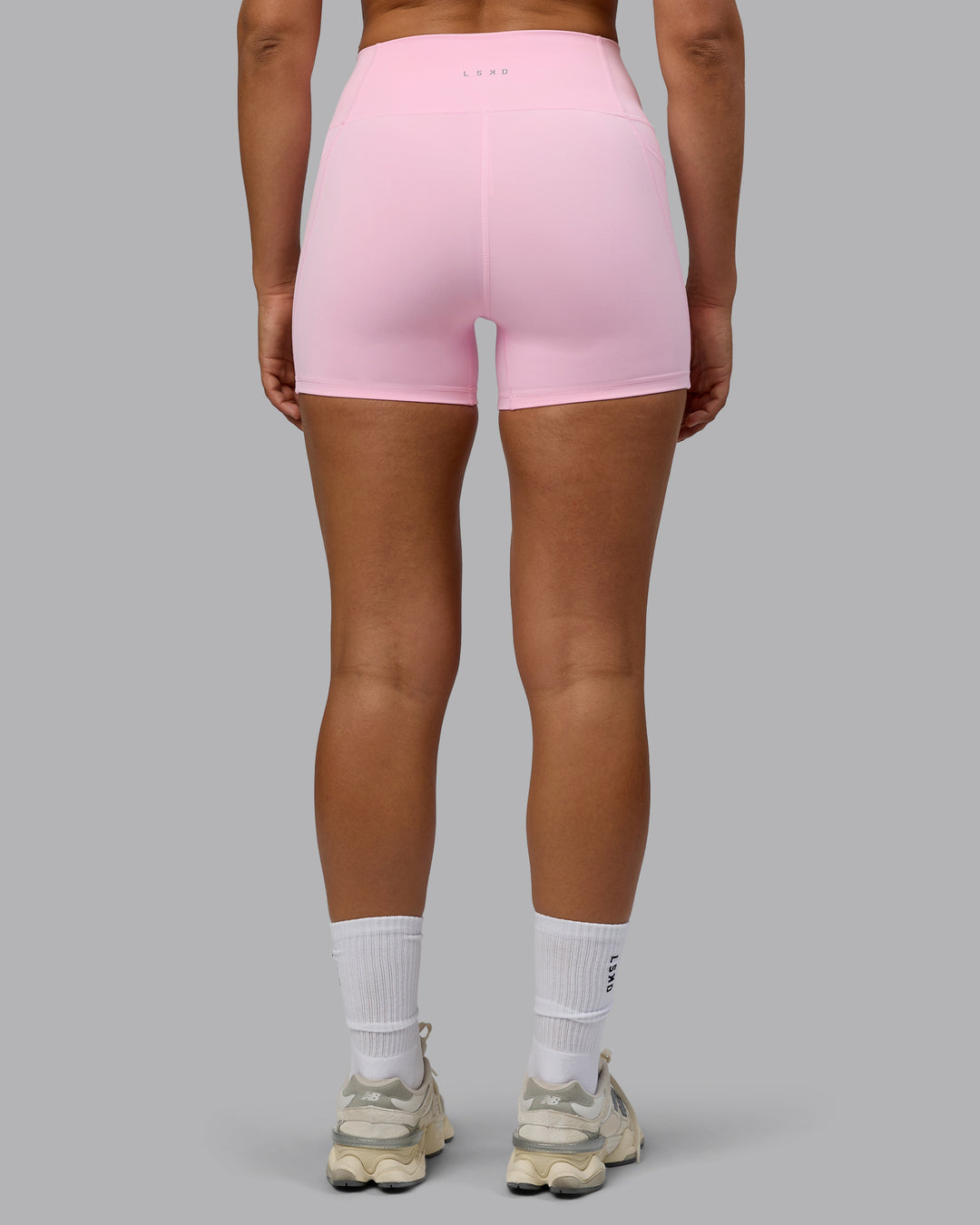 Woman wearing Fusion X-Short Tights with Pockets - Pale Pink