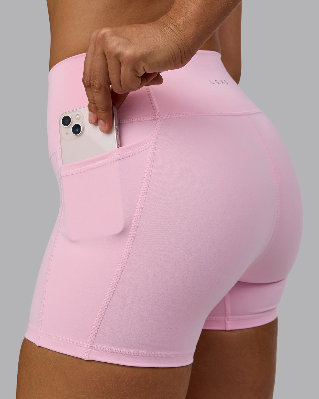 Woman wearing Fusion X-Short Tights with Pockets - Pale Pink