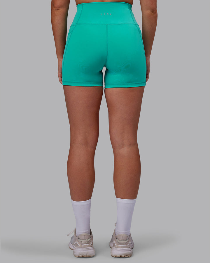 Woman wearing Fusion X-Short Tights - Turquoise Tide
