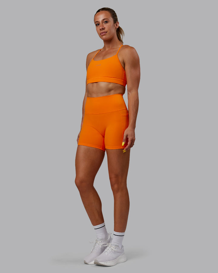 Woman wearing Fusion X-Short Tights - Vibrant Orange
