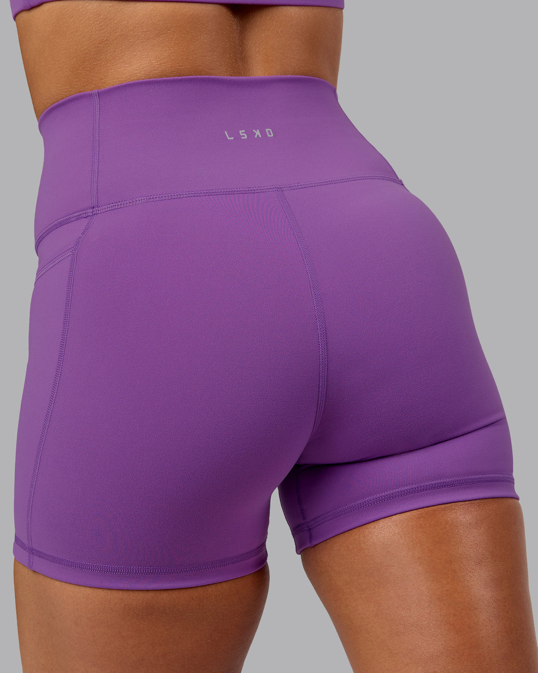 Woman wearing Fusion X-Short Tights With Pockets - Purple Fizz