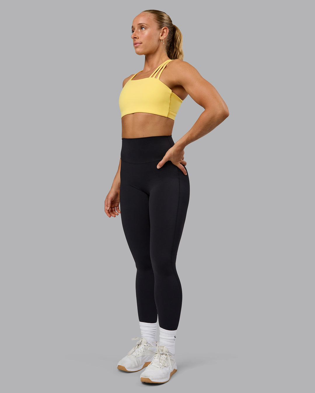 Woman wearing Galvanise Sports Bra - Lemon