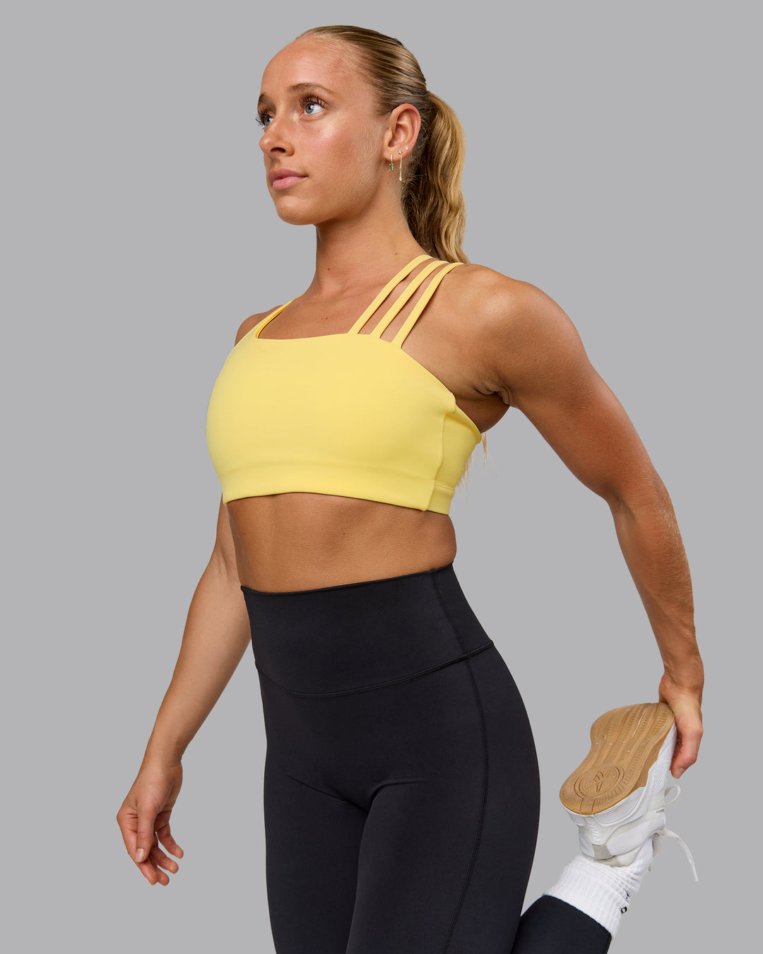 Woman wearing Galvanise Sports Bra - Lemon