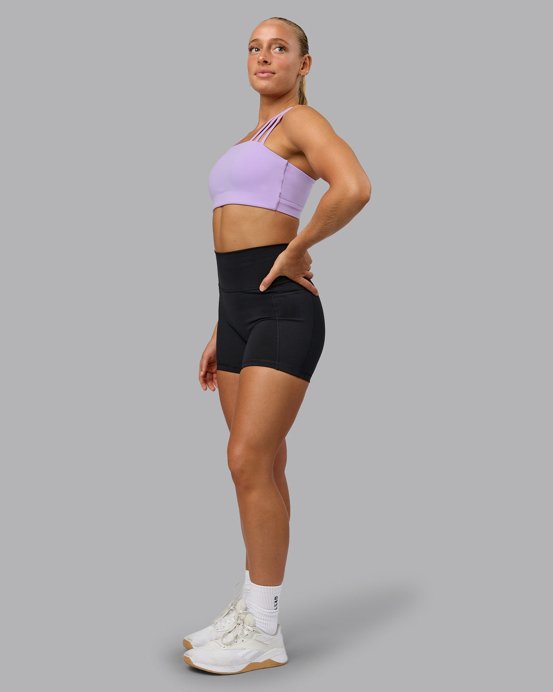 Woman wearing Galvanise Sports Bra - Pale Lilac