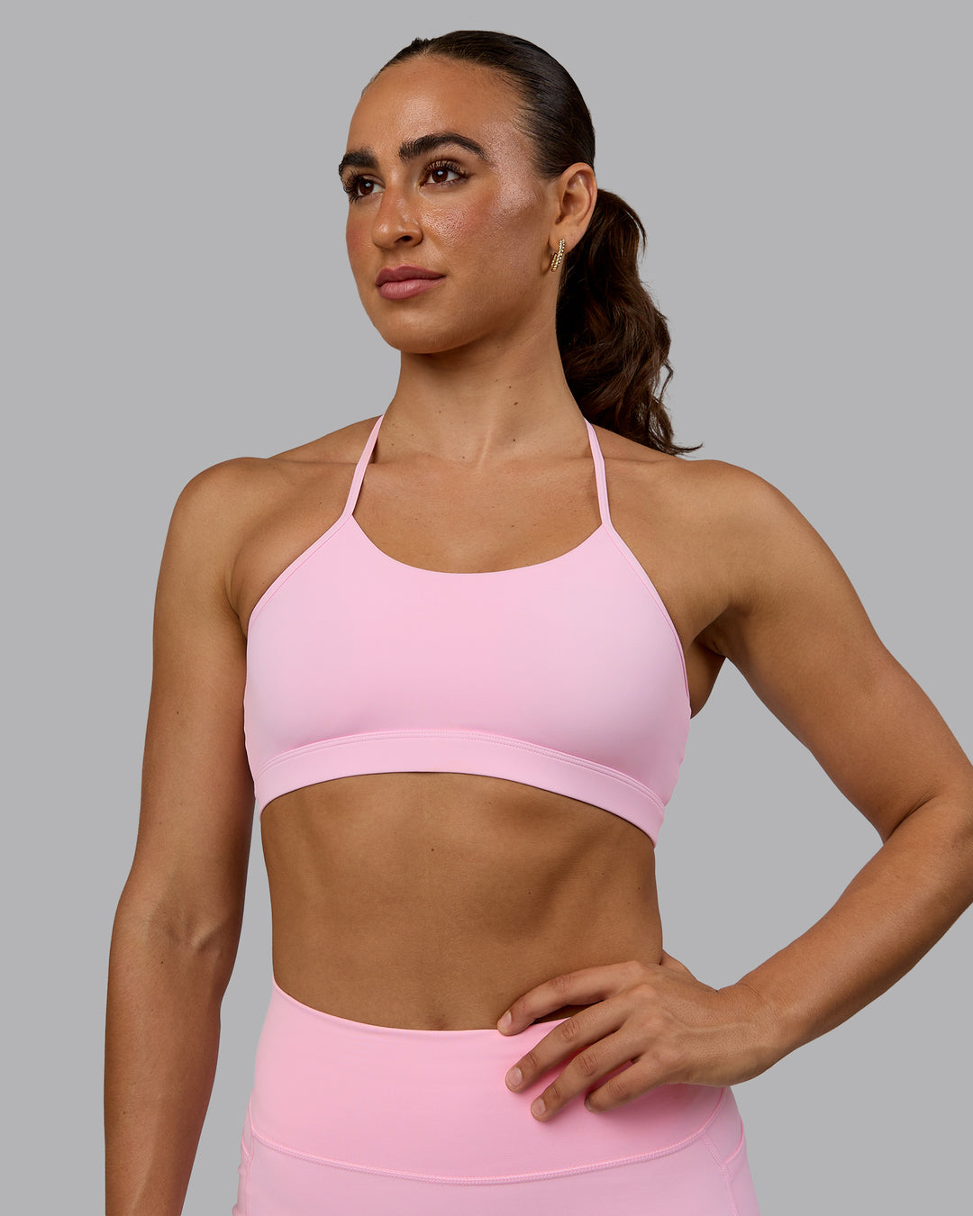 Woman wearing Glow Sports Bra - Pale Pink