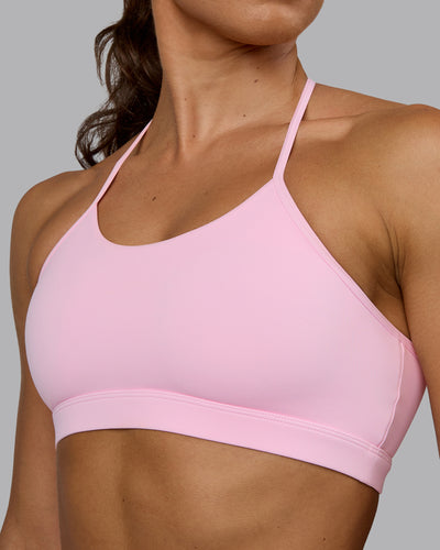 Woman wearing Glow Sports Bra - Pale Pink