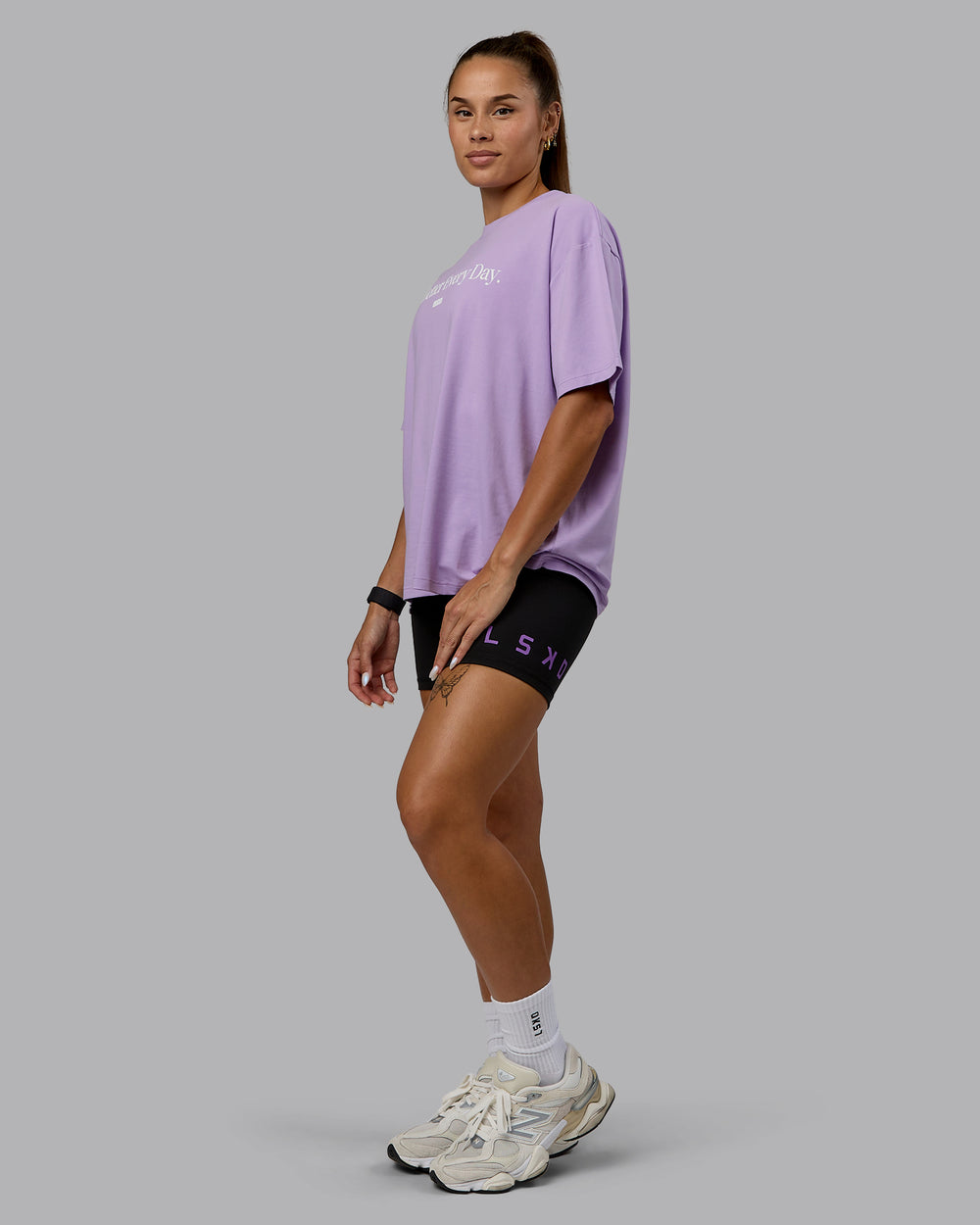 Woman wearing Go-To 1% Better FLXCotton Oversized Tee - Pale Lilac-White