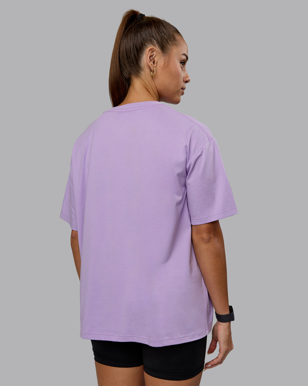 Woman wearing Go-To 1% Better FLXCotton Oversized Tee - Pale Lilac-White