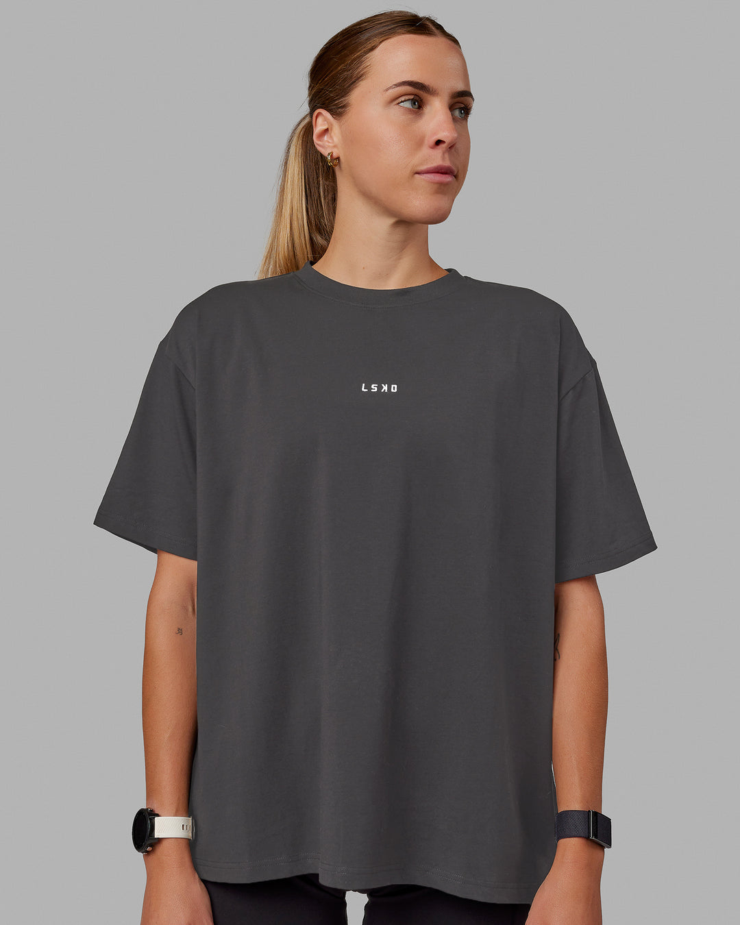 Woman wearing Go-To FLXCotton Oversized Tee - Dark Storm-White