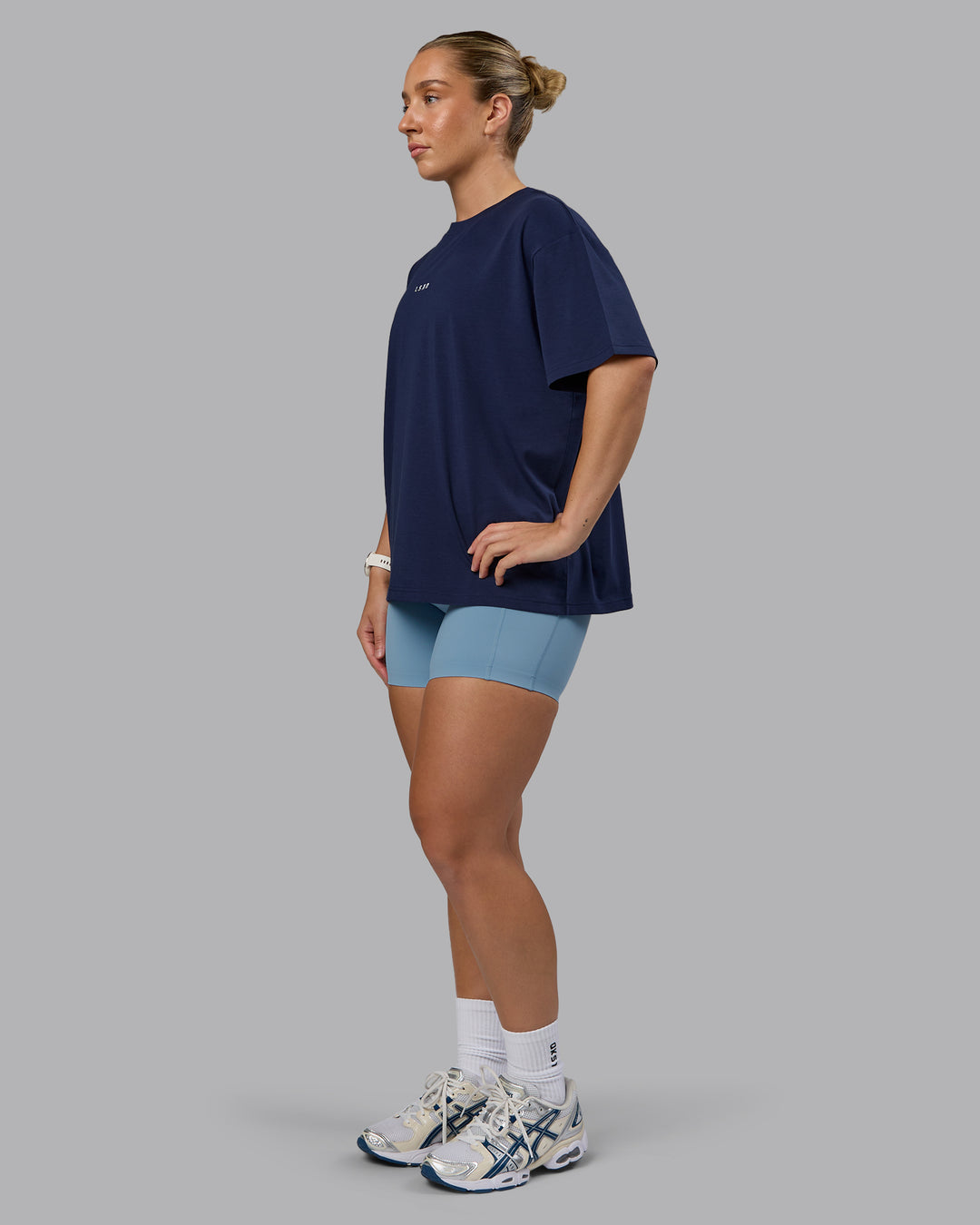 Woman wearing Go-To FLXCotton Oversized Tee - Future Navy-White