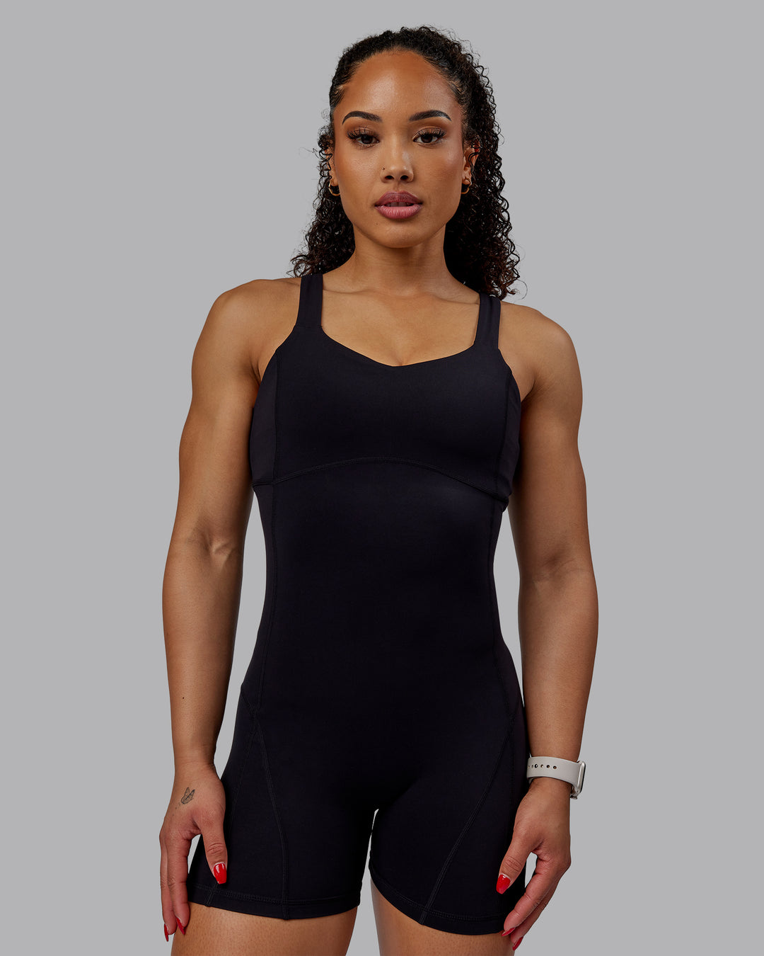 Woman wearing Inertia Bodysuit - Black