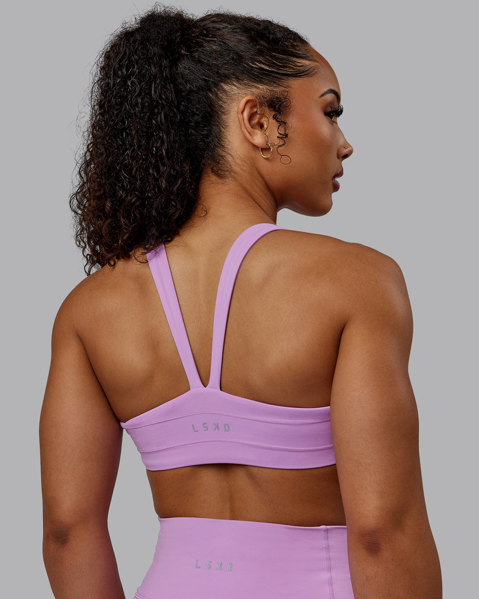 Woman wearing Inertia Sports Bra - Light Violet