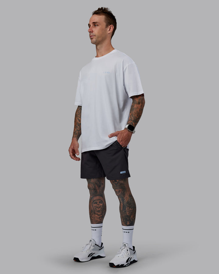 Man wearing LSKD x Logan Martin FLXCotton Tee Oversize - White-Windsurfer
