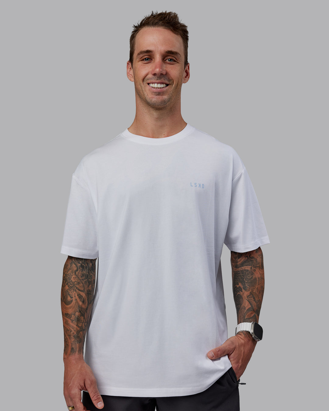 Man wearing LSKD x Logan Martin FLXCotton Tee Oversize - White-Windsurfer