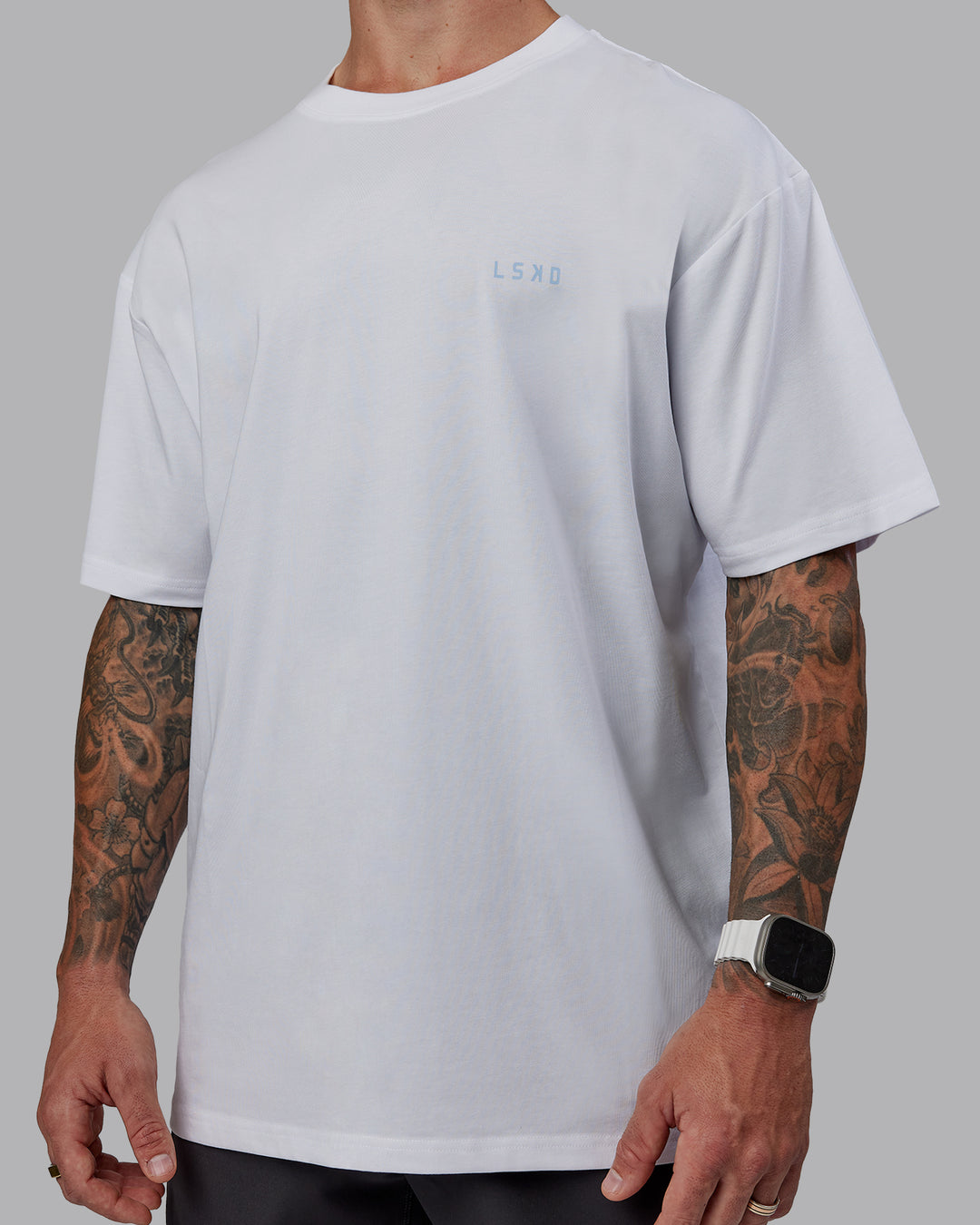 Man wearing LSKD x Logan Martin FLXCotton Tee Oversize - White-Windsurfer