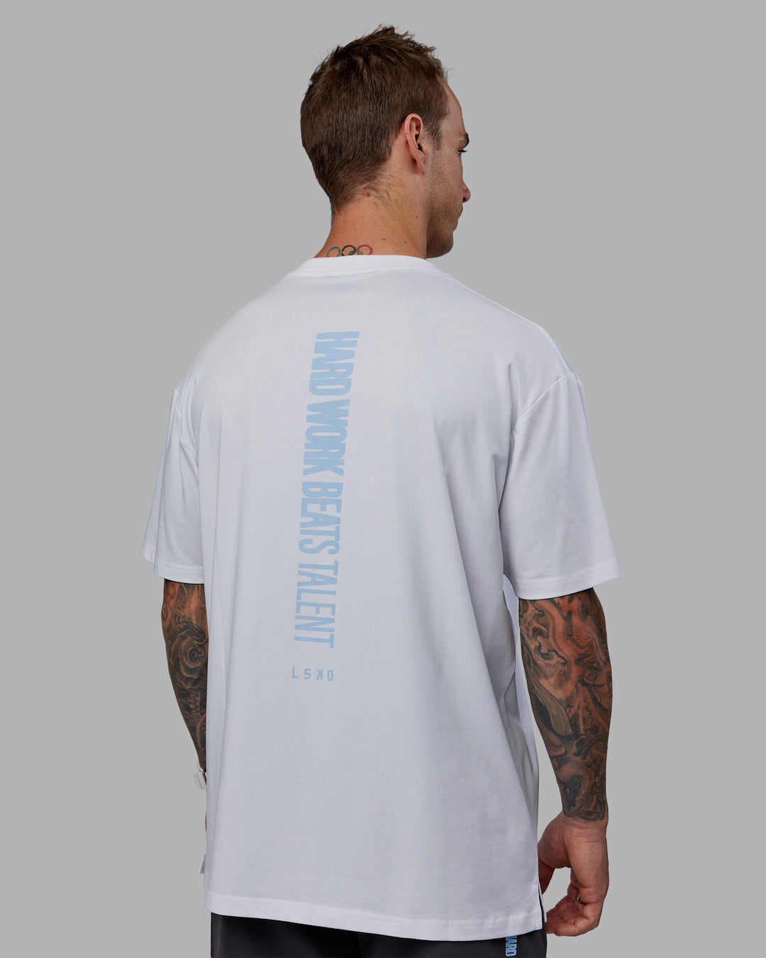 Man wearing LSKD x Logan Martin FLXCotton Tee Oversize - White-Windsurfer