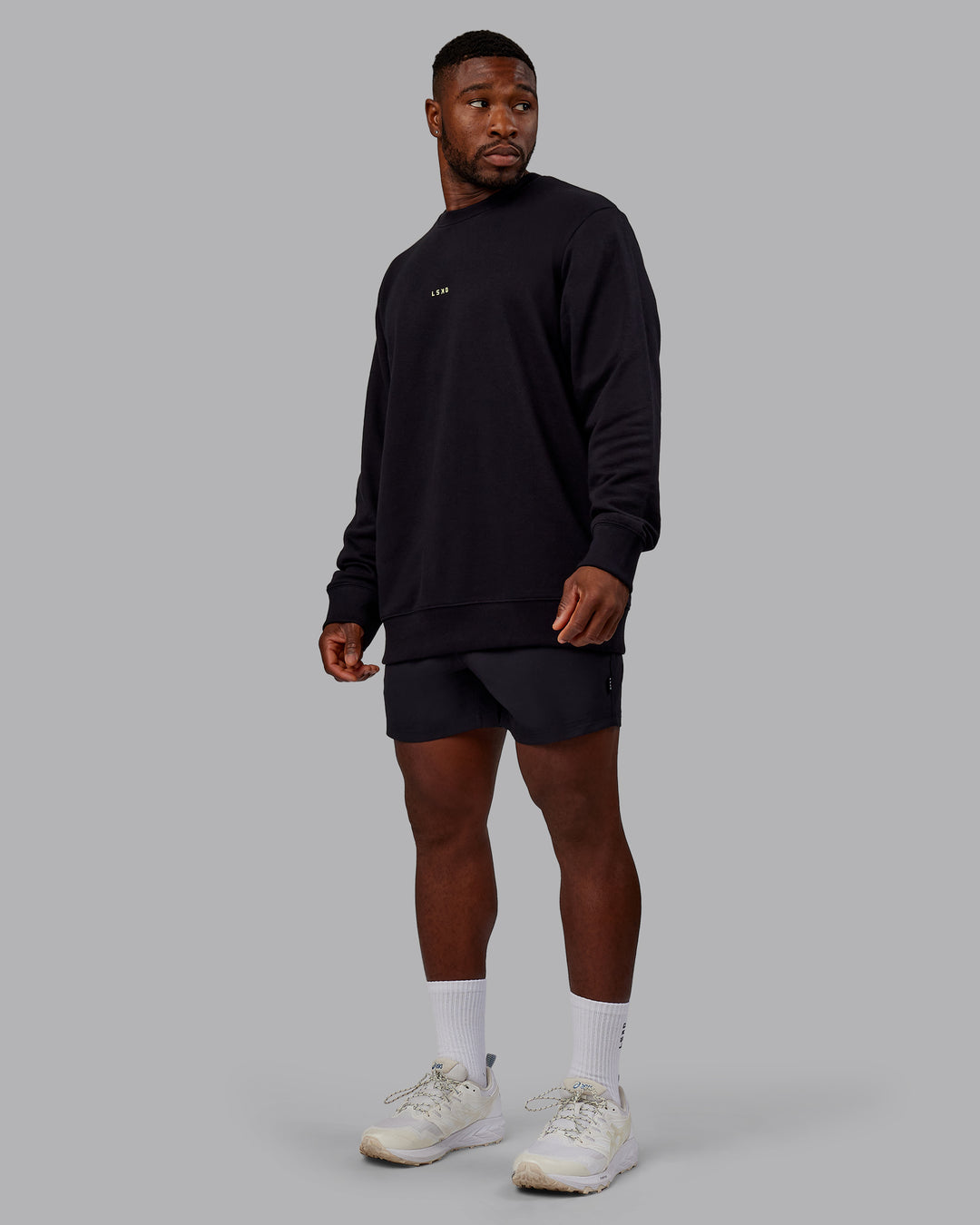 Man wearing Leg It Sweater - Black-Volt