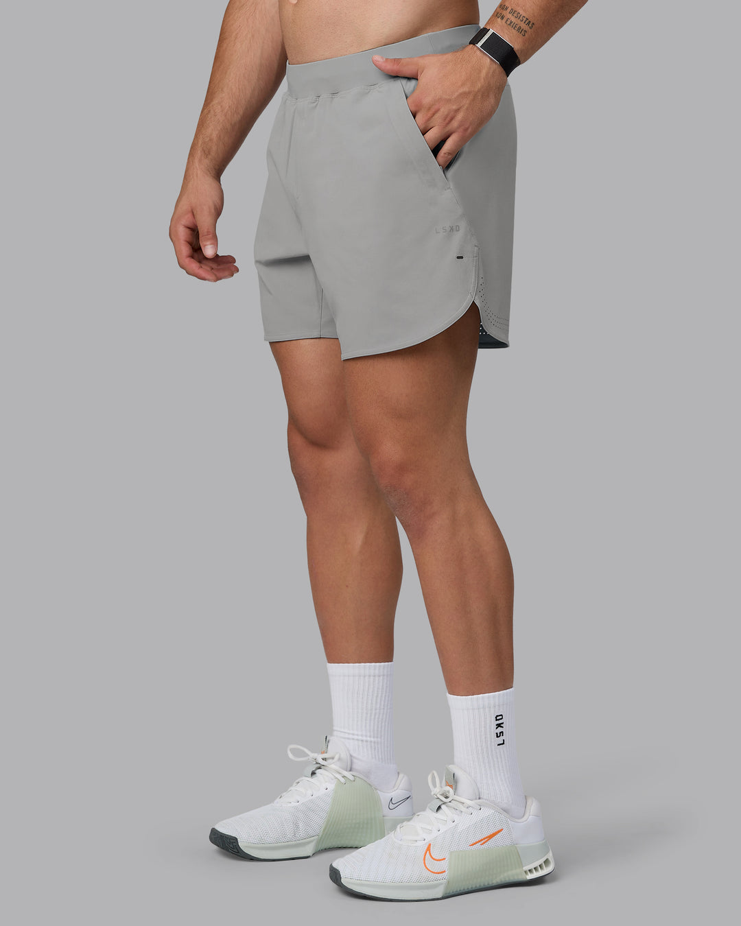 Man wearing Lift 6&quot; Lined Performance Shorts - Circular Grey